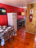 Cabin | Private kitchen | Full-size fridge, microwave, oven, toaster