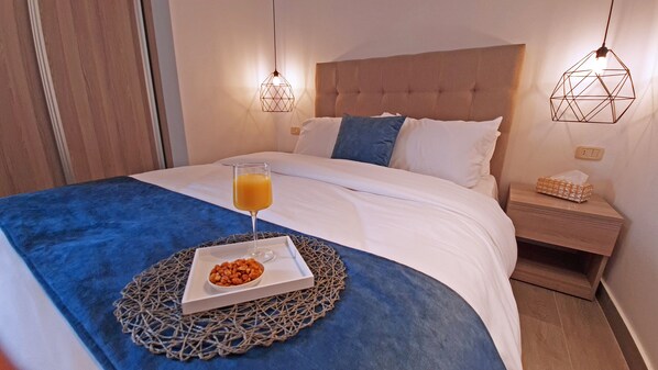 2 habitaciones, tabla de planchar con plancha, wifi y ropa de cama