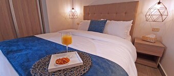 Enjoy a luxurious and comfortable stay at Red Carpet Hotel Apartments.