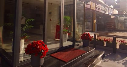 Enjoy a luxurious and comfortable stay at Red Carpet Hotel Apartments.