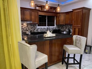 Private kitchen - Apartamentos Primer Nivel 3 min de la Autopista Duarte (Bonao)