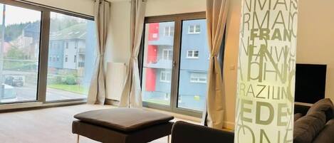 Deluxe appartement | Woonruimte | Flatscreentelevisie