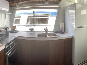 Fridge, microwave, coffee/tea maker, paper towels