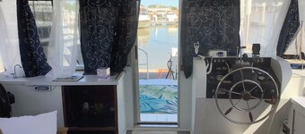 Wake up ON the lake aboard Sleuth!