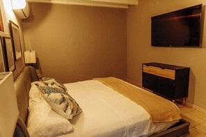 2 habitaciones, tabla de planchar con plancha, wifi y ropa de cama