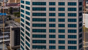 A tall building with the sign "Atlantic Palace" at the top.