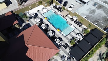 Outdoor pool, open 8:00 AM to 9:00 PM, pool cabanas (surcharge)