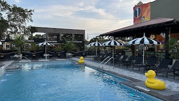 Outdoor pool, open 8:00 AM to 9:00 PM, cabanas (surcharge)