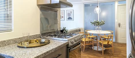 Fridge, oven, stovetop, cookware/dishes/utensils