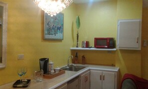 Fridge, microwave, coffee/tea maker, electric kettle