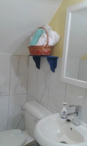 Shower, towels, soap, shampoo