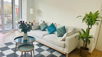 Apartamento Deluxe | Sala de estar