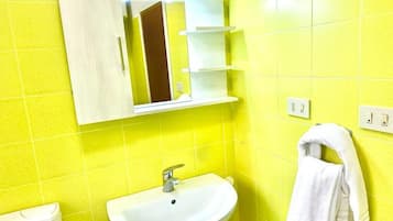 Ensemble douche/baignoire, douche à « effet pluie », sÚche-cheveux