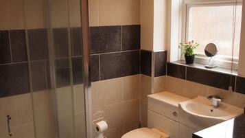 Hair dryer, towels, soap, toilet paper