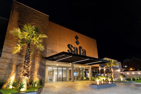 Front of property – evening/night. Safa Hotel