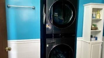 Hair dryer, towels, soap, shampoo