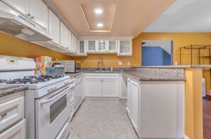 Fridge, stovetop, cookware/dishes/utensils