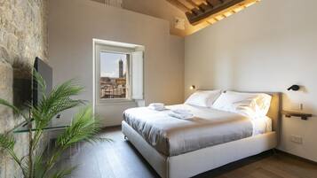 3 habitaciones, tabla de planchar con plancha, wifi y ropa de cama