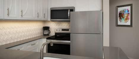 Coffee/tea maker, fridge, microwave, oven
