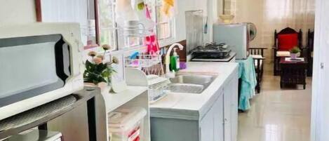 Mini-fridge, microwave, electric kettle, toaster