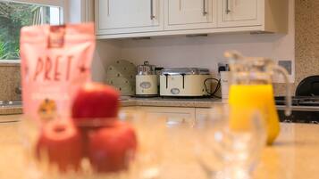 Fridge, dishwasher, electric kettle, cookware/dishes/utensils
