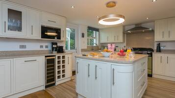 Fridge, dishwasher, electric kettle, cookware/dishes/utensils