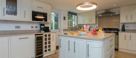 Fridge, dishwasher, electric kettle, cookware/dishes/utensils