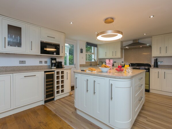 Fridge, dishwasher, electric kettle, cookware/dishes/utensils