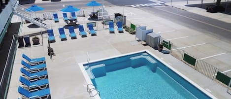 Seasonal outdoor pool, open 9:00 AM to 8:00 PM, sun loungers