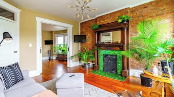 Design House | Living area | 32-inch Smart TV with digital channels, Netflix, Hulu