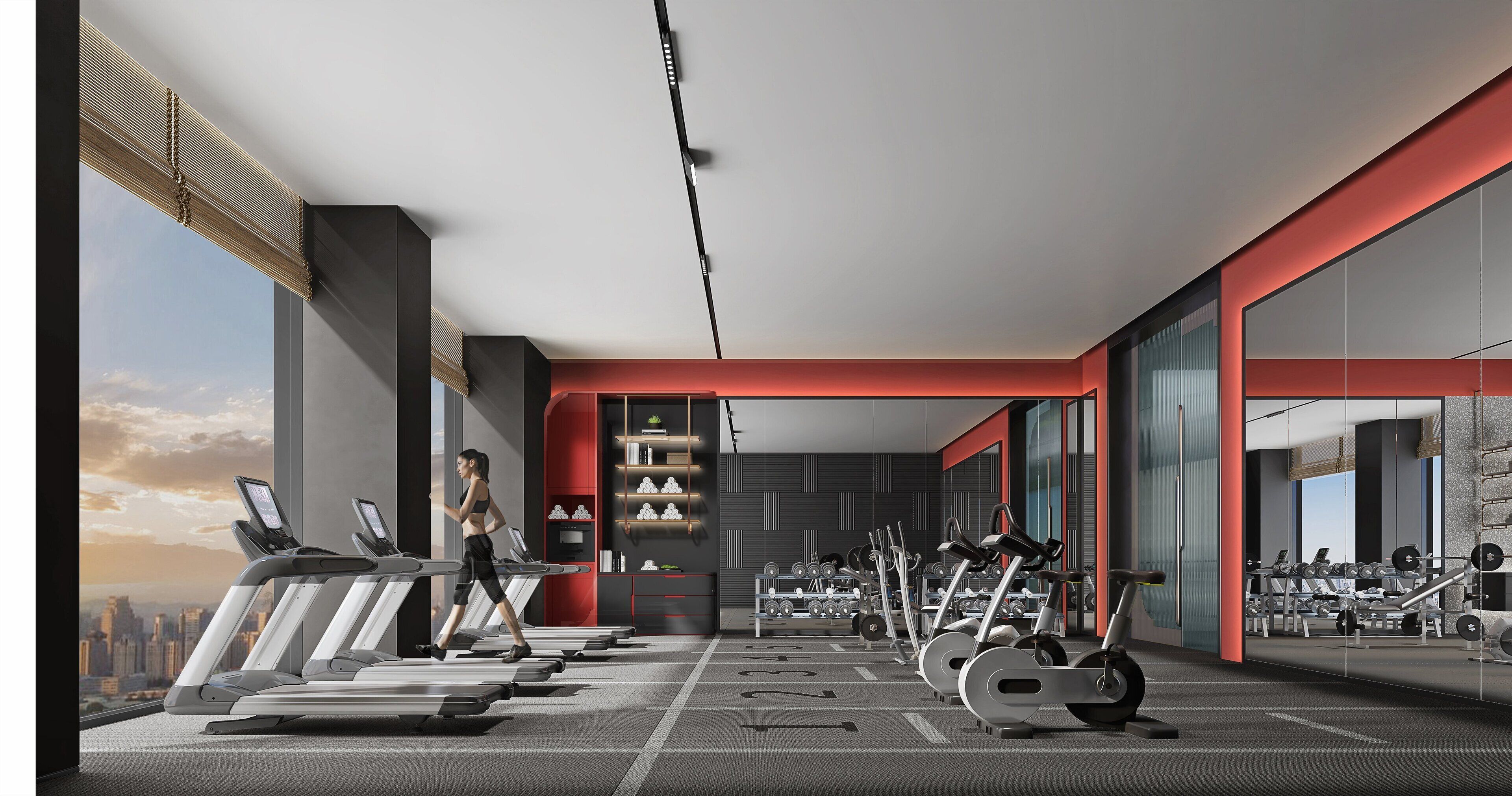 Un gimnasio moderno con cintas de correr, bicicletas estáticas y equipo de pesas.