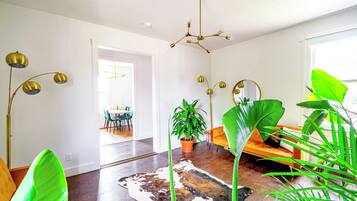 Jungle Thyme Upstairs | Living area | 55-inch Smart TV with digital channels, Netflix, Hulu