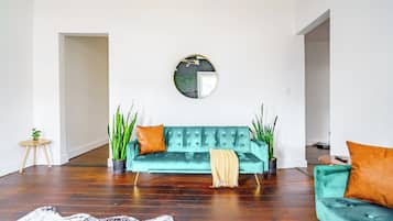 Jungle Thyme | Living area | 55-inch Smart TV with digital channels, Netflix, Hulu