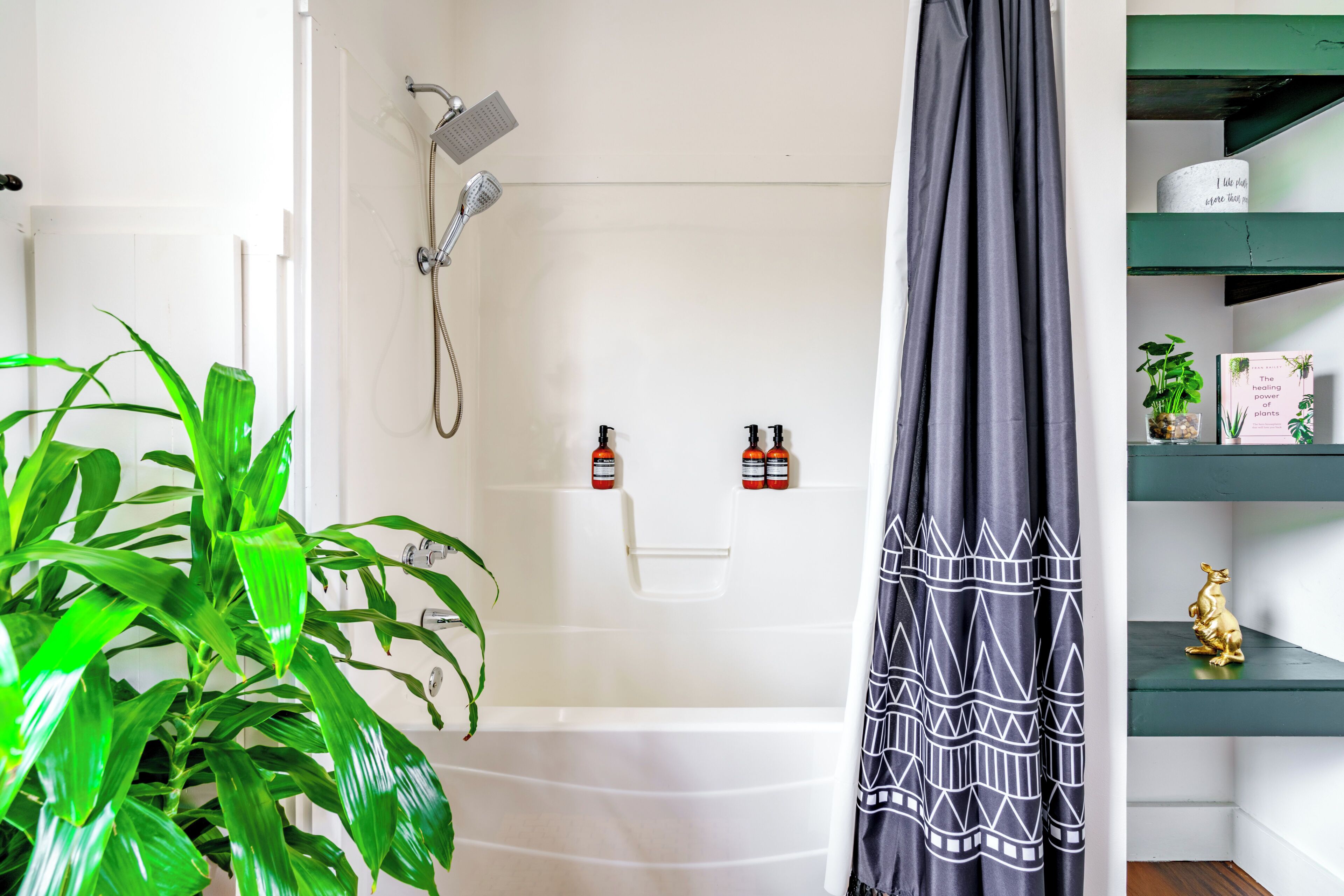 Jungle Thyme Upstairs | Bathroom | Rainfall showerhead, designer toiletries, hair dryer, towels
