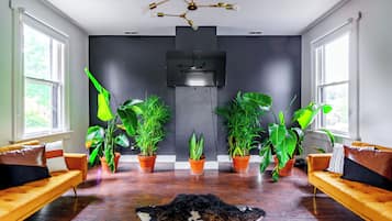 Jungle Thyme Upstairs | Living area | 55-inch Smart TV with digital channels, Netflix, Hulu
