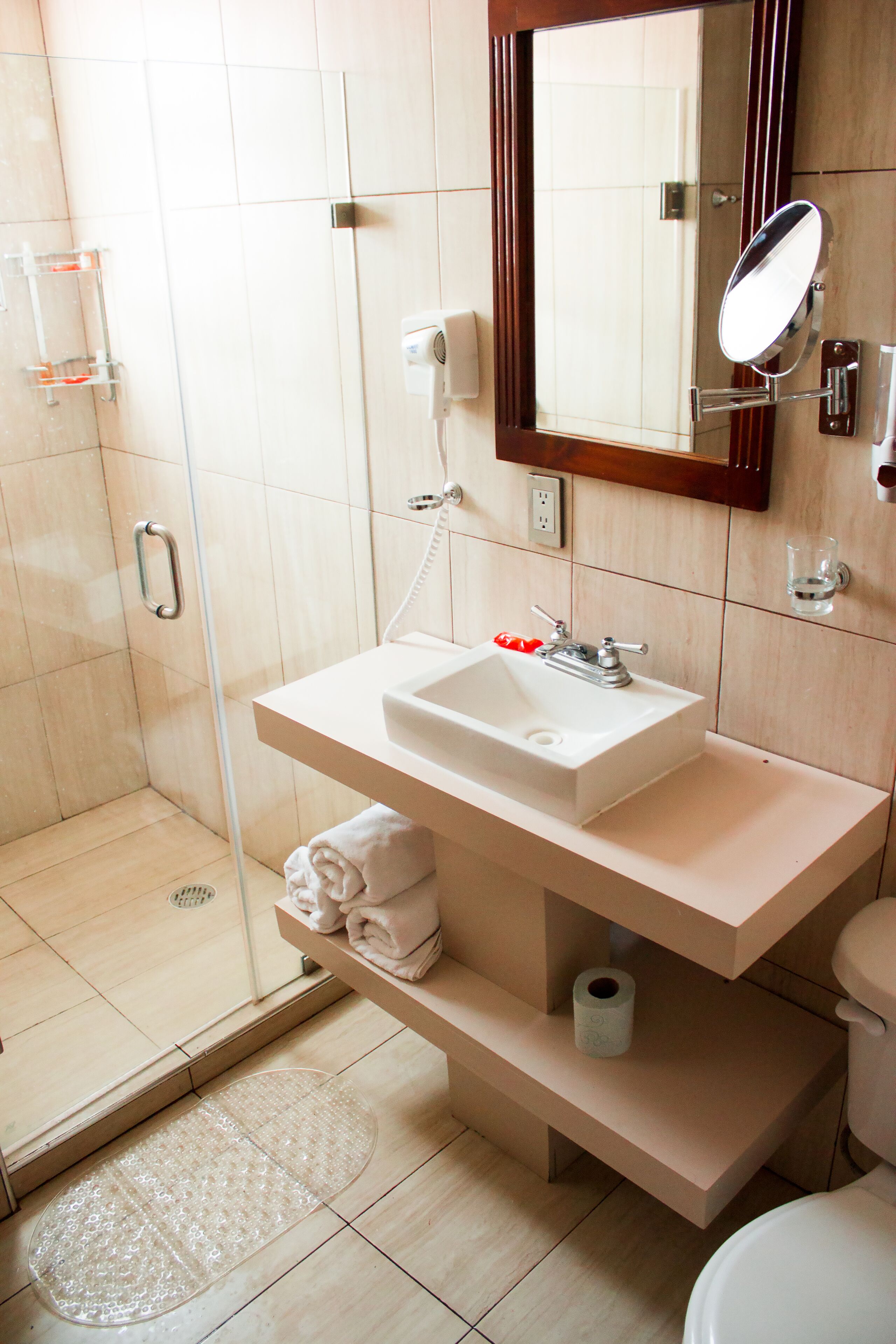 Shower, rainfall showerhead, hair dryer, towels