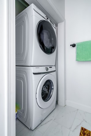 Separate tub and shower, rainfall showerhead, eco-friendly toiletries