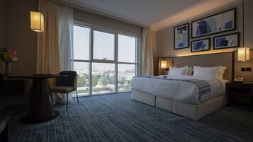 Frette Italian sheets, premium bedding, memory-foam beds, minibar