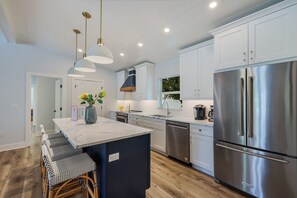 Fridge, microwave, oven, stovetop - Coconut Hut: Pool & Spa, Pool Table, Putting Green by Anna Maria Life Vacation Rentals (Anna Maria)