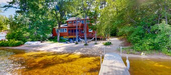 Lakeside home with private dock, firepit, grill, scenic balcony, fireplace & AC