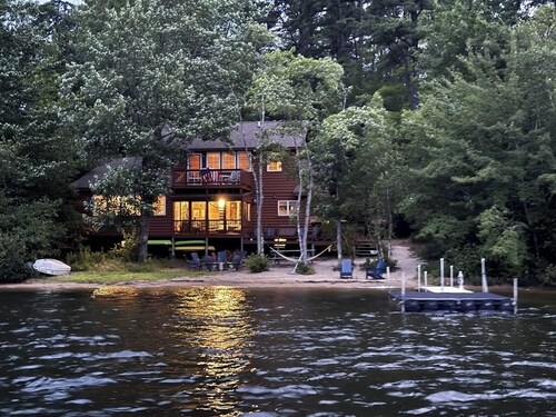 Lakeside home with private dock, firepit, grill, scenic balcony, fireplace & AC