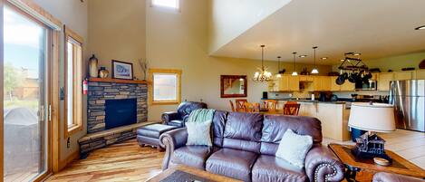 TV, fireplace, books