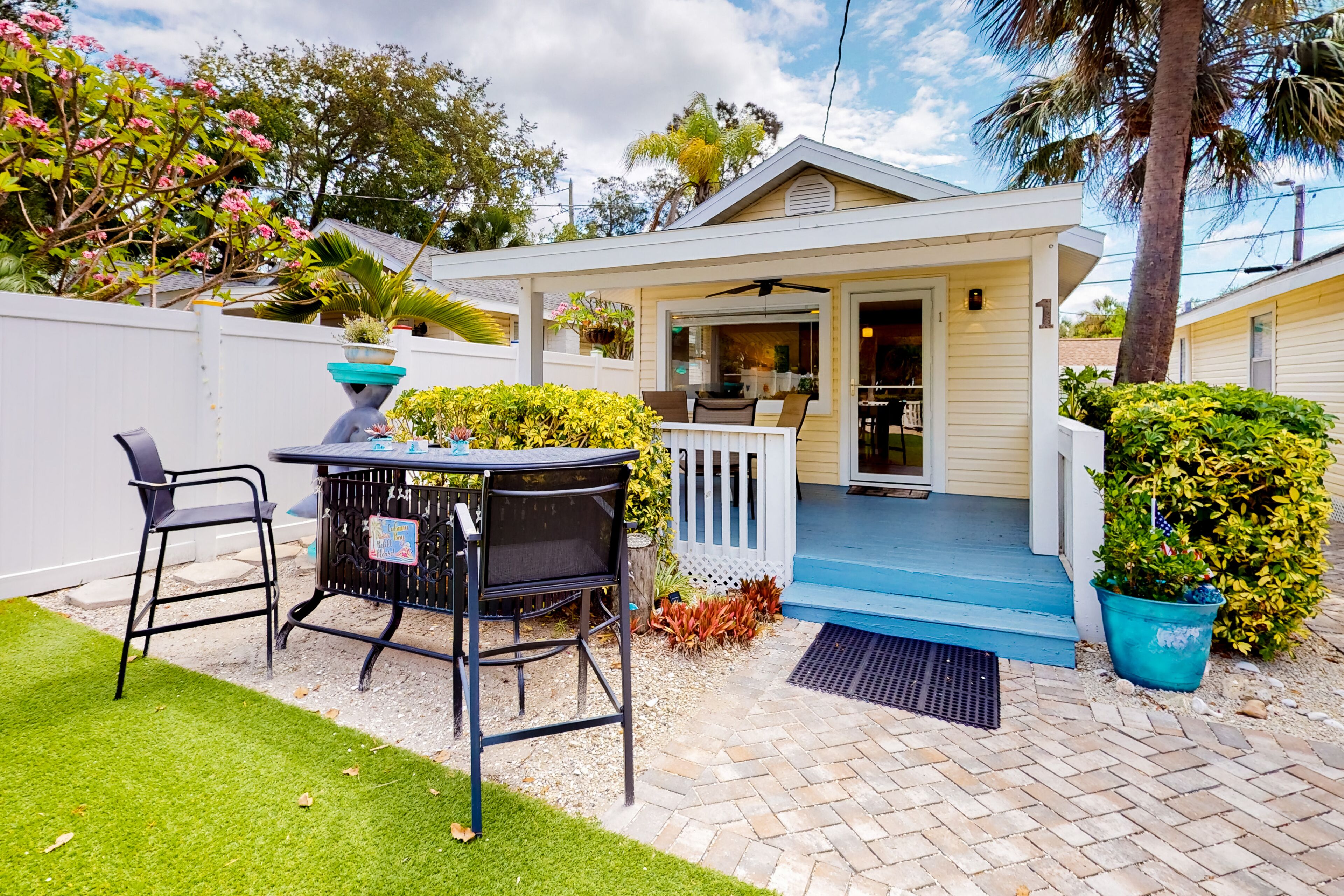Three cottages with kitchens, AC, an enclosed yard, gas grill, & a washer/dryer