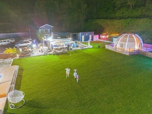 Guests can enjoy gatherings and leisure activities in this well-maintained outdoor space.