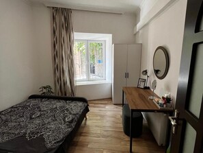 1 bedroom, iron/ironing board, WiFi, bed sheets - Opera Apartment Sleeps 4 with Patio (T'bilisi)