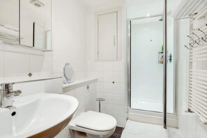 Bathtub, hair dryer, towels
