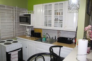 Fridge, microwave, oven, stovetop - Elegant & Stylish 2BR Condo New Kingston (Kingston)