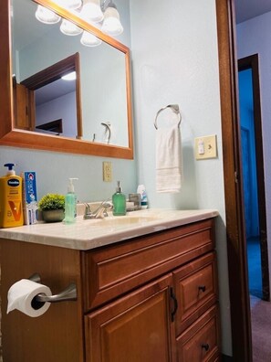 Hair dryer, towels, soap, shampoo