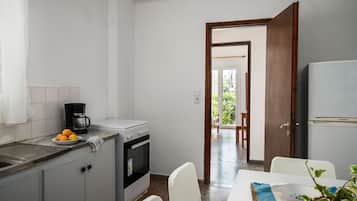 Apartment, 3 Bedrooms | Private kitchen | Fridge, oven, stovetop, espresso maker