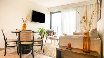 Apartamento elite | Área de estar | TV de tela plana